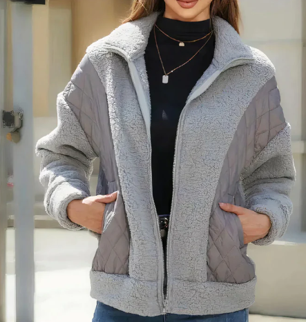 Sherpa-jacke für damen mit reibverschluss und gesteppten details